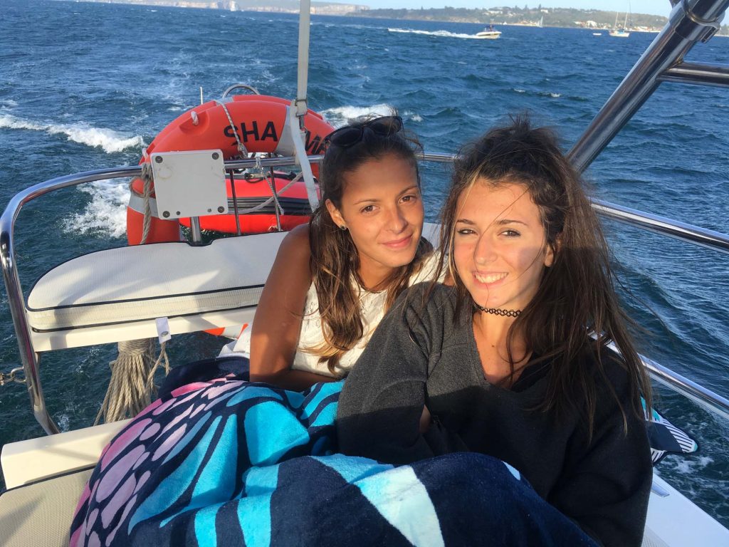 Two guests enjoying the sail aboard Sha Meduza