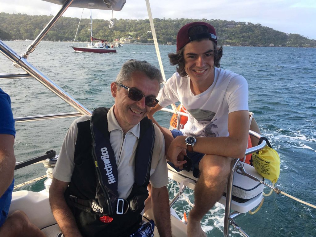 Guests in the cockpit on a sunny Pittwater afternoon